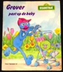  - Grover past op de baby