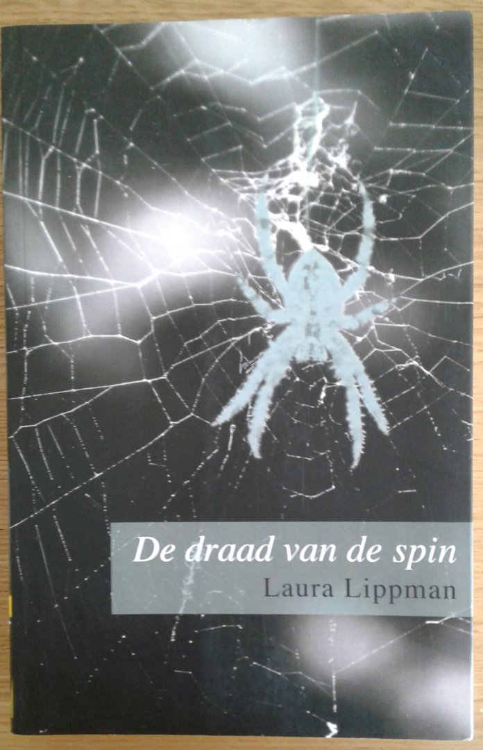 Lippman, Laura - De draad van de spin