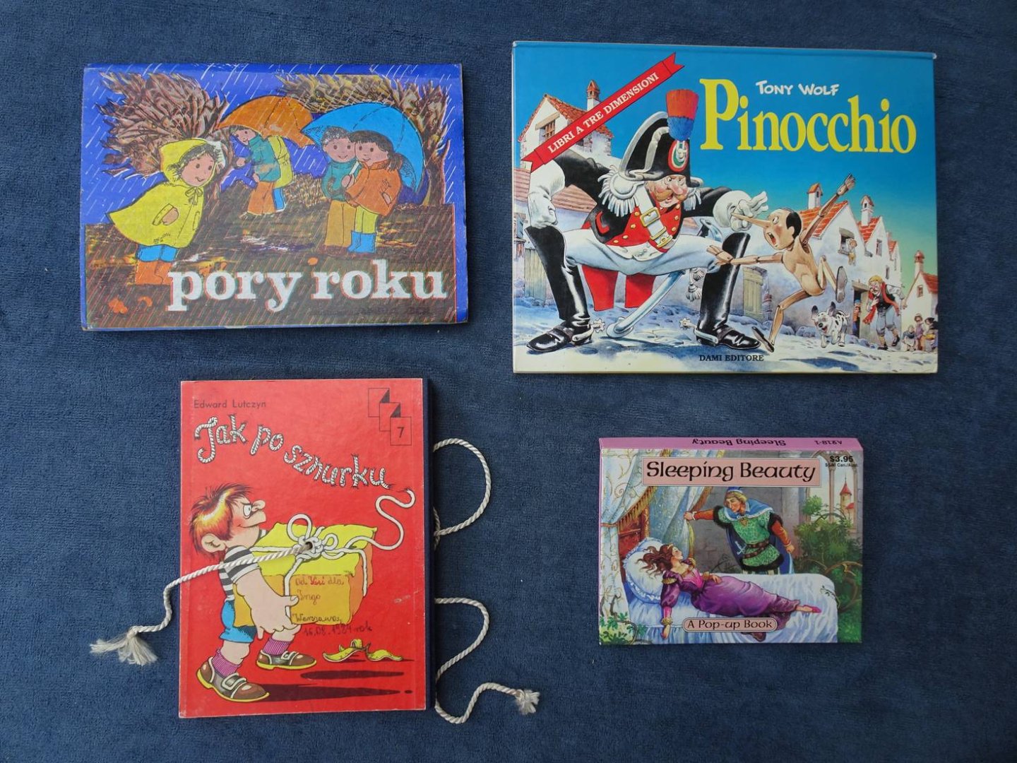 Lutczyn, Edward, Tony Wolf, et al. - Jak po szhurku/ Sleeping Beauty/ Pory Roku/ Pinocchio. 4 buitenlandse pop-up boeken/ 4 foreign pop-up books.