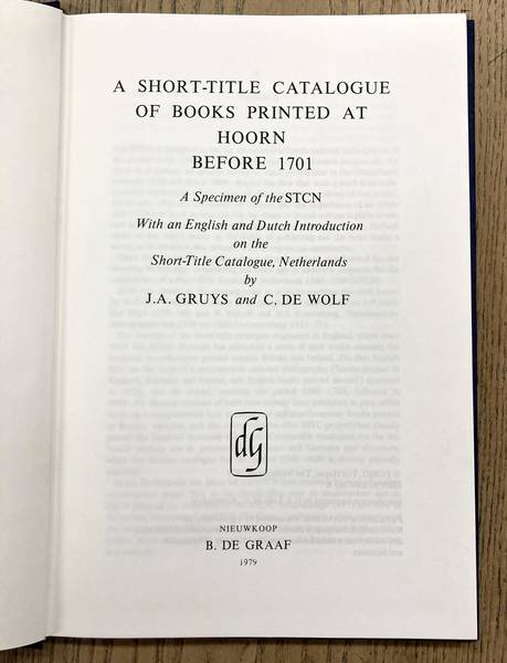 GRUYS, J.A. & C. DE WOLF. - A short-title catalogue of books printed at Hoorn before 1701. A specimen of the STCN. With an English and Dutch introduction on the Short-Title Catalogue, Netherlands.