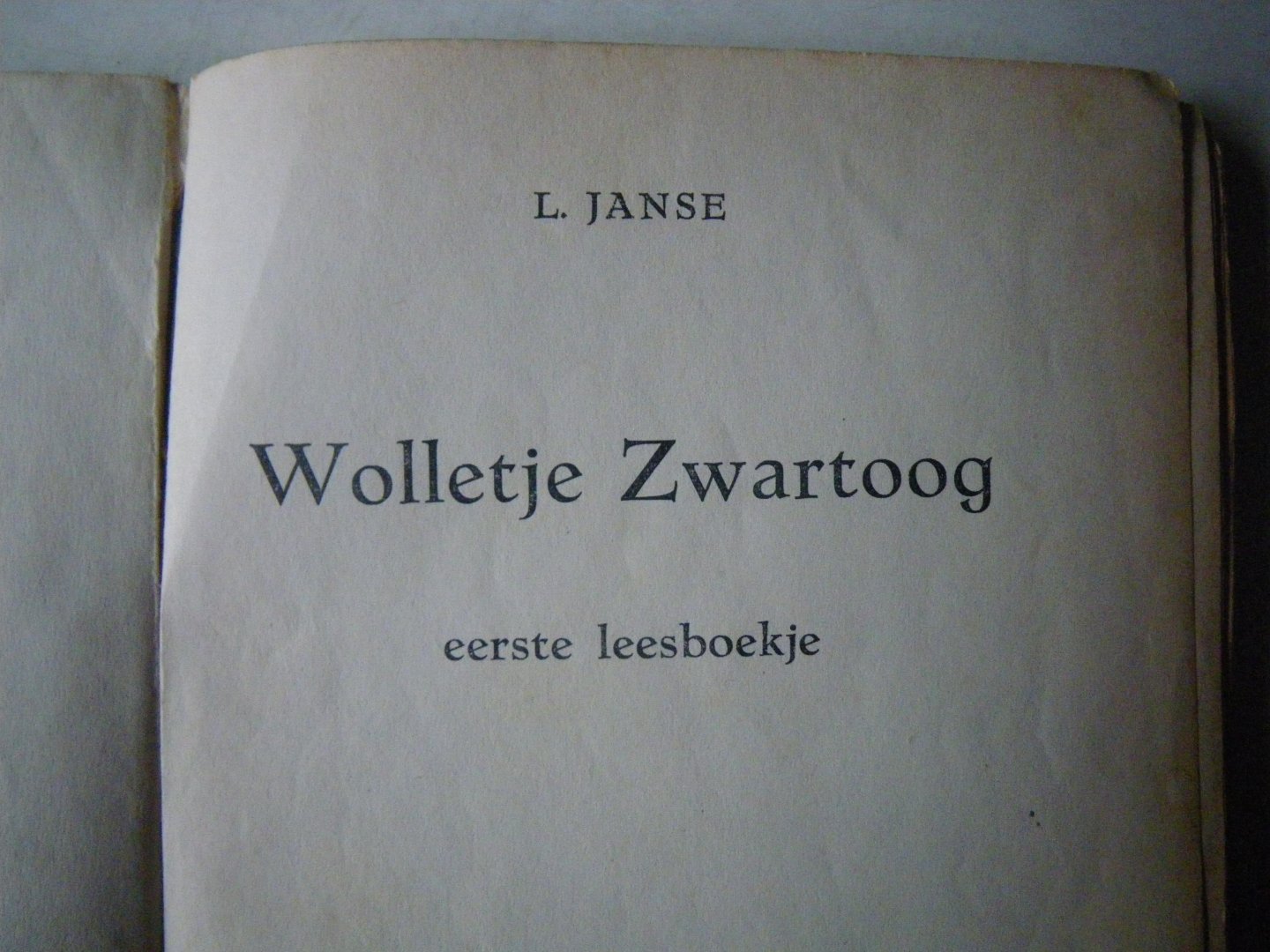 JANSE l, - wolletje zwartoog (eerste leesboekje)