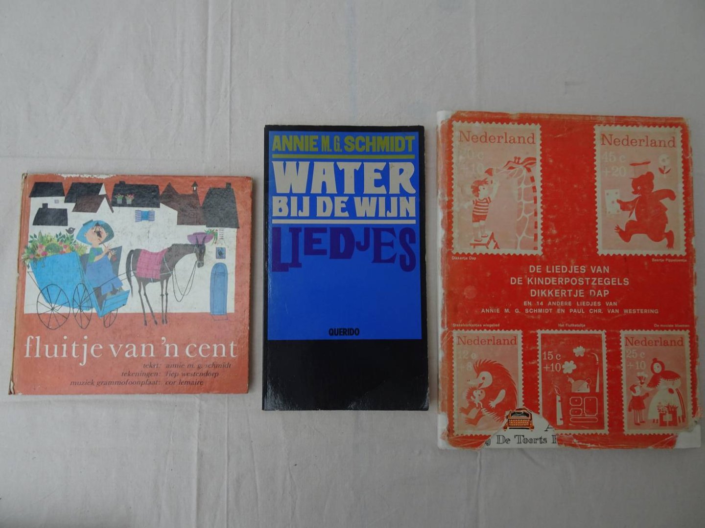 Schmidt, Annie M.G., Fiep Westendorp, et al.. - Fluitje van 'n cent/ Water bij de wijn. Liedjes/ De liedjes van de kinderpostzegels Dikkertje Dap. 3 titels.