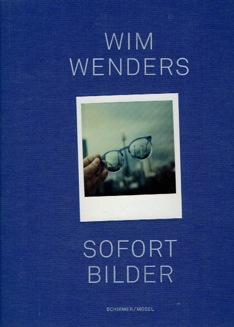 WENDERS, Wim - Sofort Bilder - 403 Polaroids und 36 Geschichten dazu von Wim Wenders - und einem Beitrag von Sieben Photographien von Annie Leibovitz. [1. Auflage].