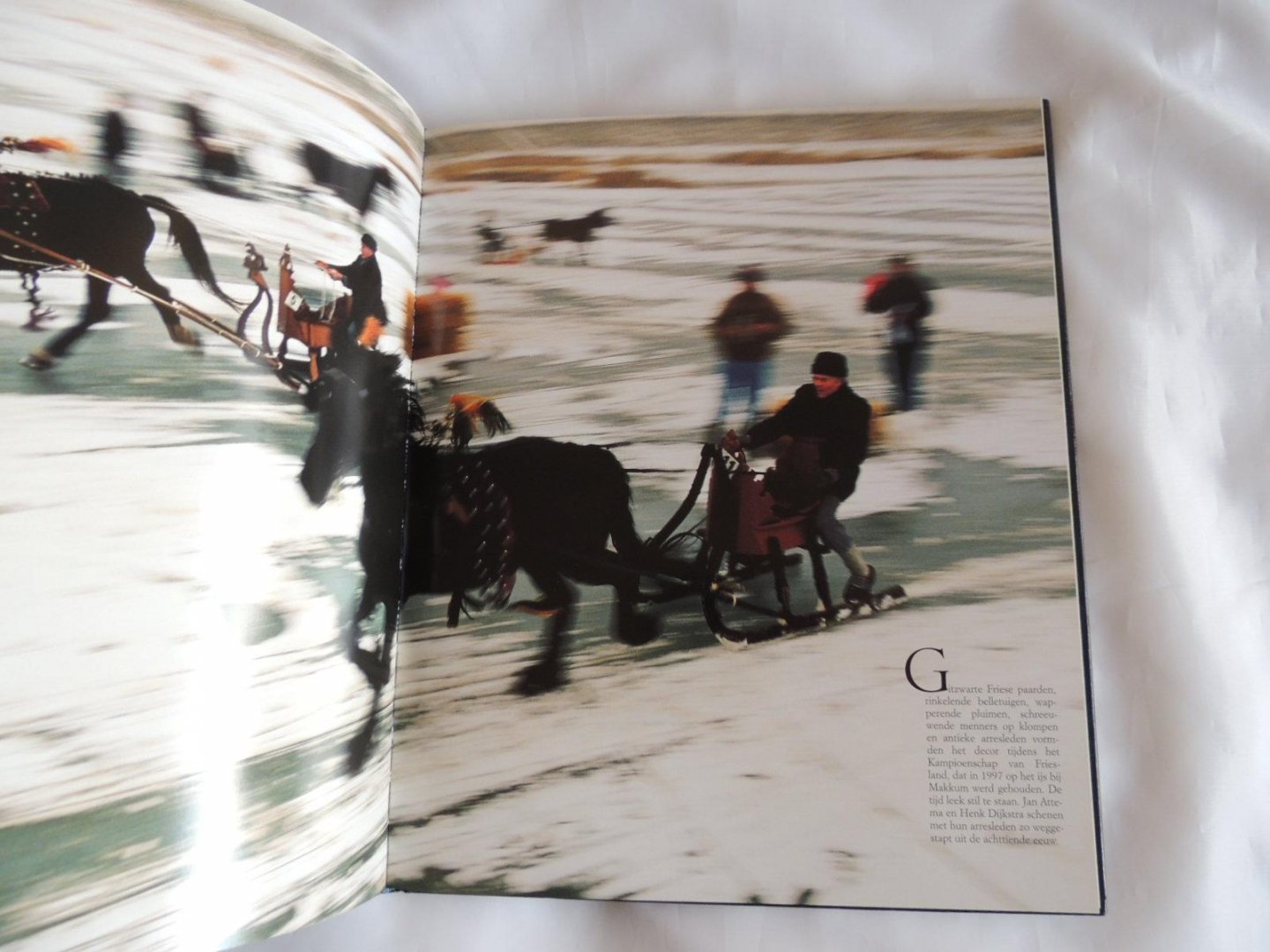 Couwenhoven, Ron (tekst) en Rentmeester, Co (fotografie) - Holland op het ijs (Fotoboek over de schaatssport.)