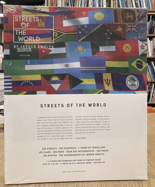 SWOLFS, JEROEN. - Streets of the World. 195 streets, 195 countries, 7 years of travelling, 195 flags, 204 maps, over 900 infographics, 460 pages, 195 photos + the iphonography of Jeroen Swolfs. A signed and numbered art print of Sweden inside, size 24 X 36 cm, ...
