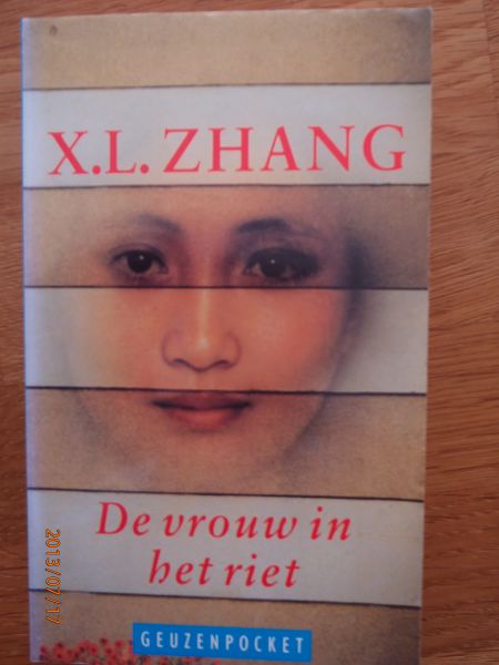 Zhang, X.L. - De vrouw in het riet. Roman. Vertaling Rint Sybesma.