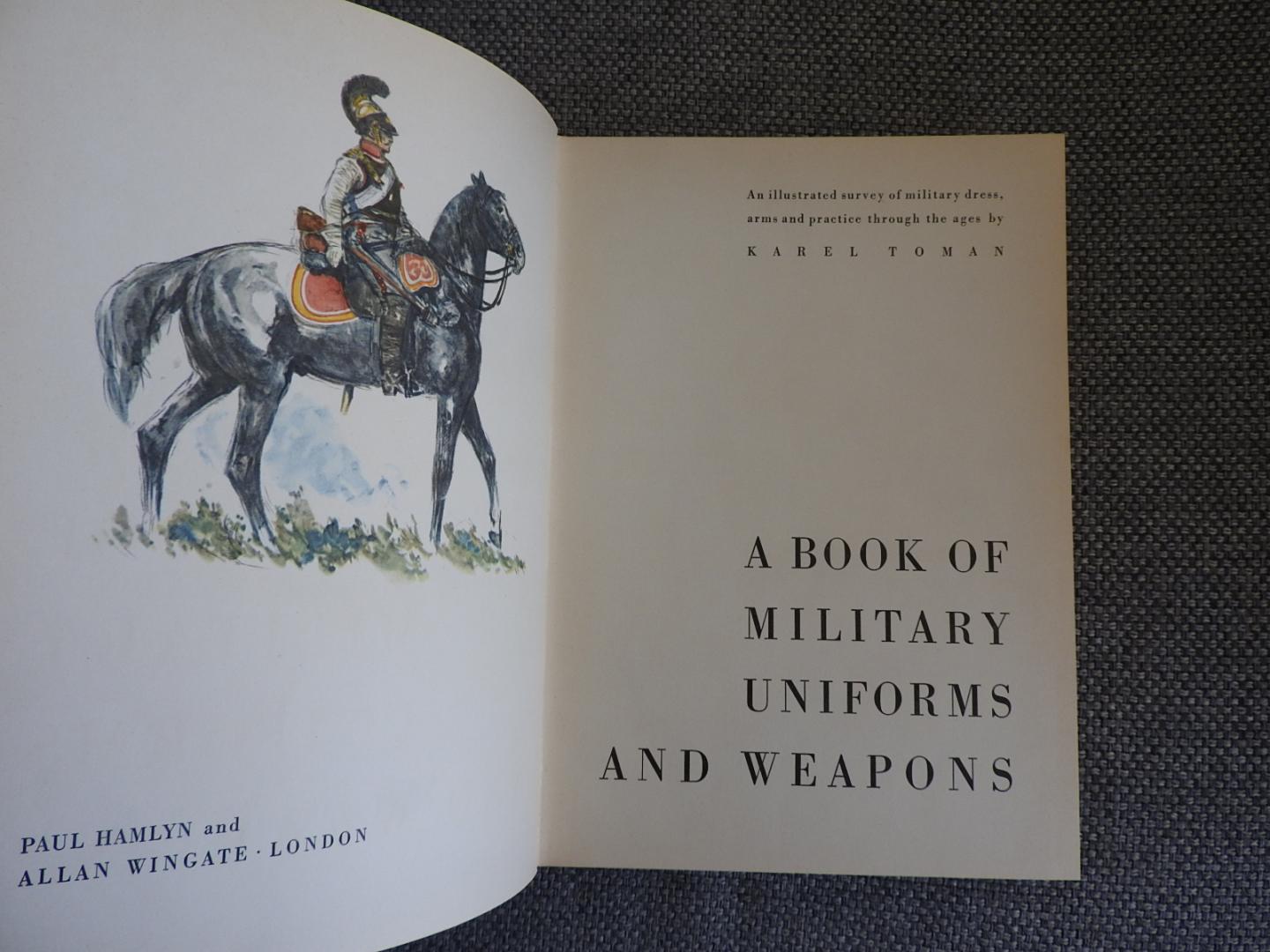 Toman, Karel - A Book of Military Uniforms and Weapons. An illustrated survey of military dress, arms and practice through the ages