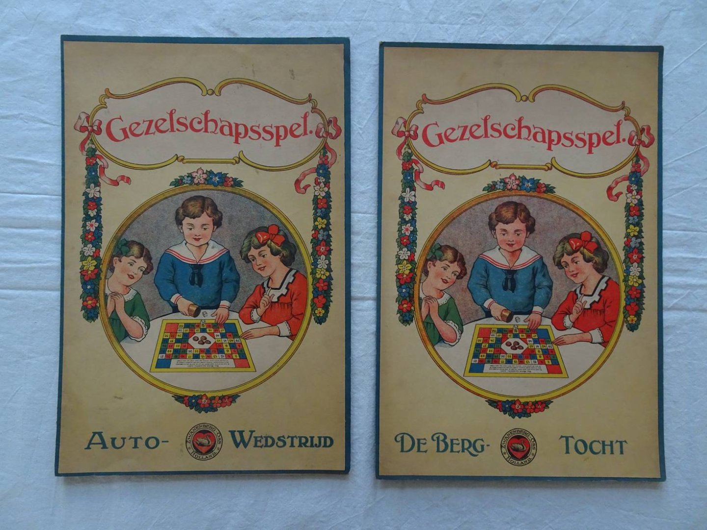 N.n.. - Gezelschapsspel. Autowedstrijd/ De Bergtocht. 2 spelen.