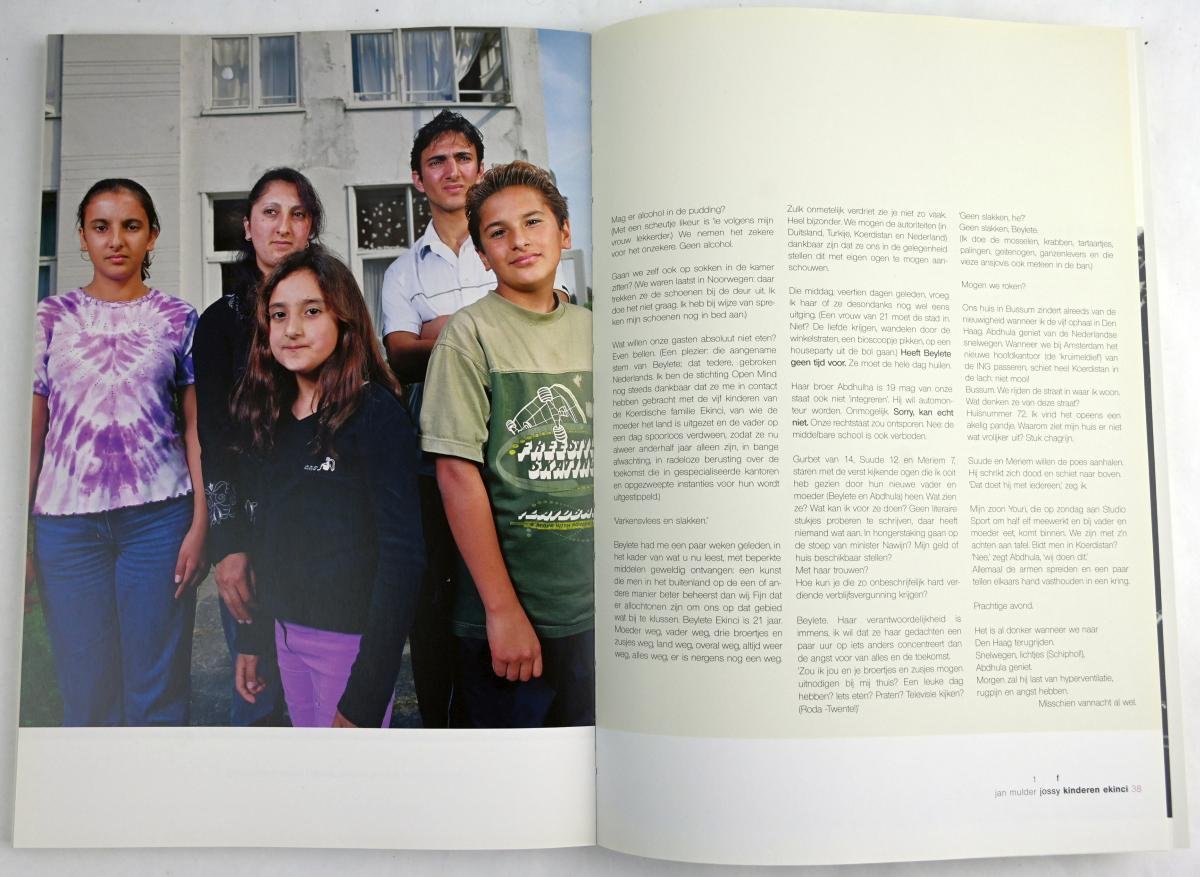 diversen - 50 ontmoetingen. Een boek over ontmoetingen met asielzoekers (2 foto's)
