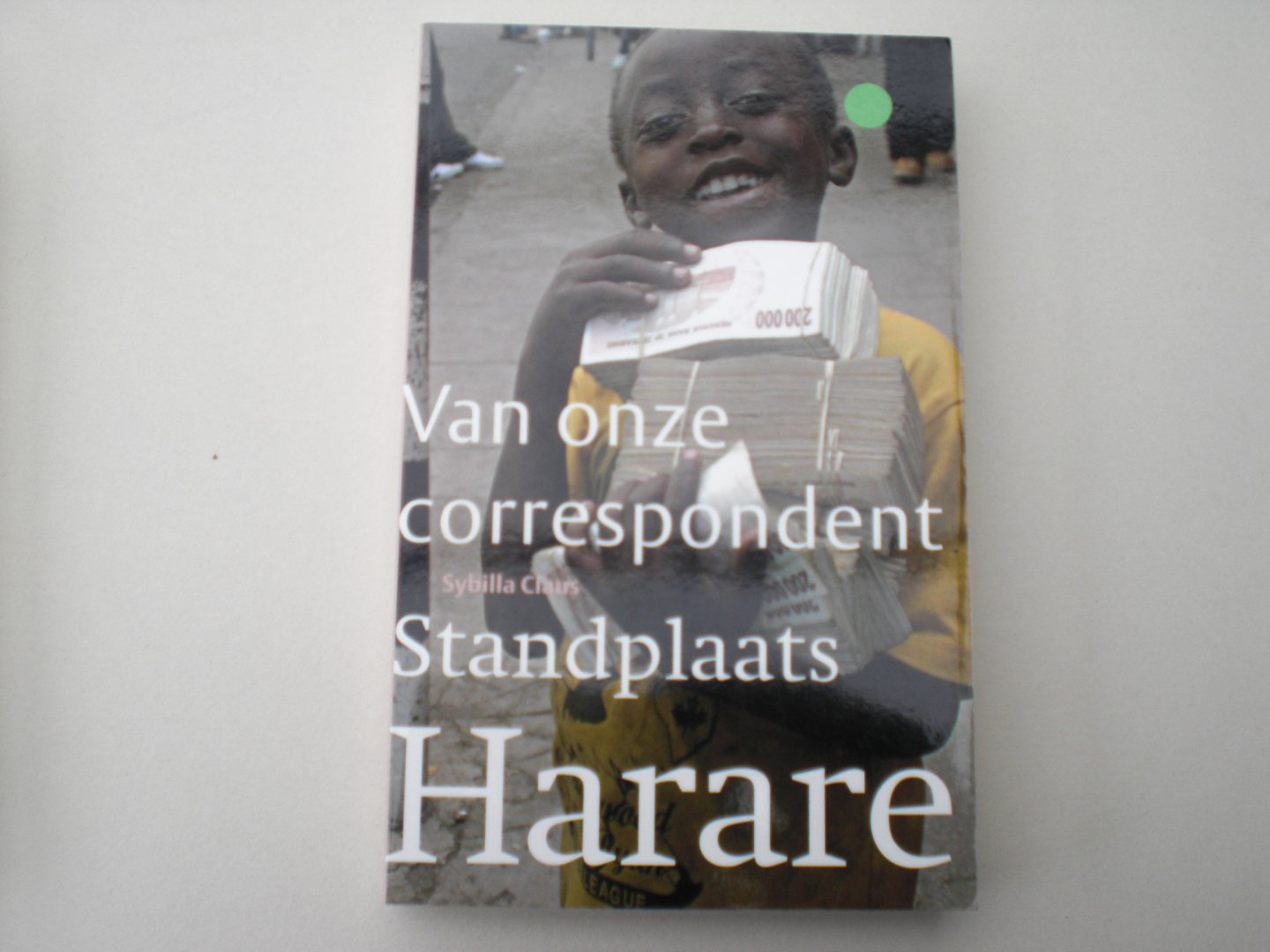 Claus, S. - Van onze correspondent Standplaats Harare