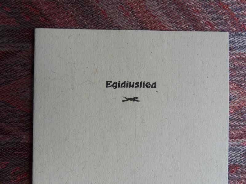 Kusters, Frans; Emmerik, Gerard van; Wilmink, Willem (vertaling); Koenegracht, Frank [ de auteurs van de vier verschillende uitgaven die een geheel vormen ]. - Nadere Uitleg [246a]; Nop vindt het geluk [246b]; Egidiuslied [246c]; Drie gedichten [246d].