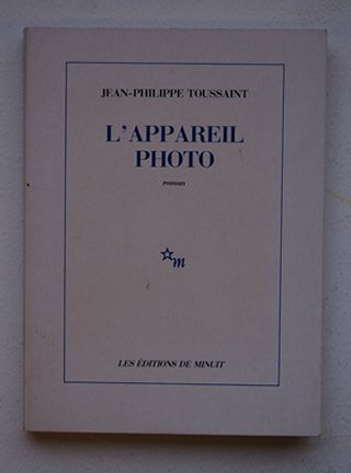 Toussaint, Jean - Philippe - L' Appareil Photo. ( Blindstempeltje Ex Libris )