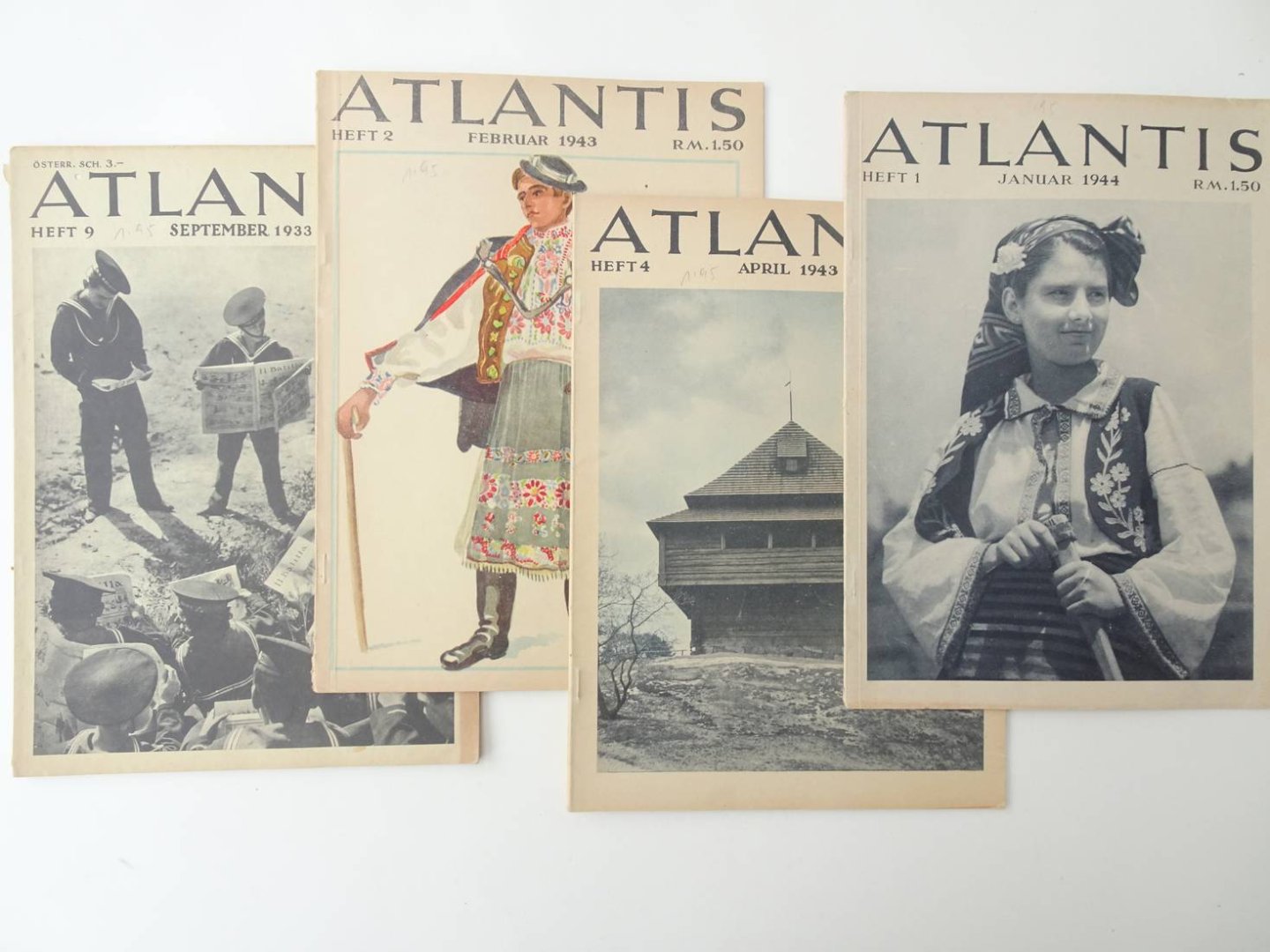 Hürlimann, Martin, et al (ed.). - Atlantis. Heft 9, September 1933. Heft 2, Februar 1943. Heft 4, April 1943.Heft 1, Januar 1944. 4 vols.