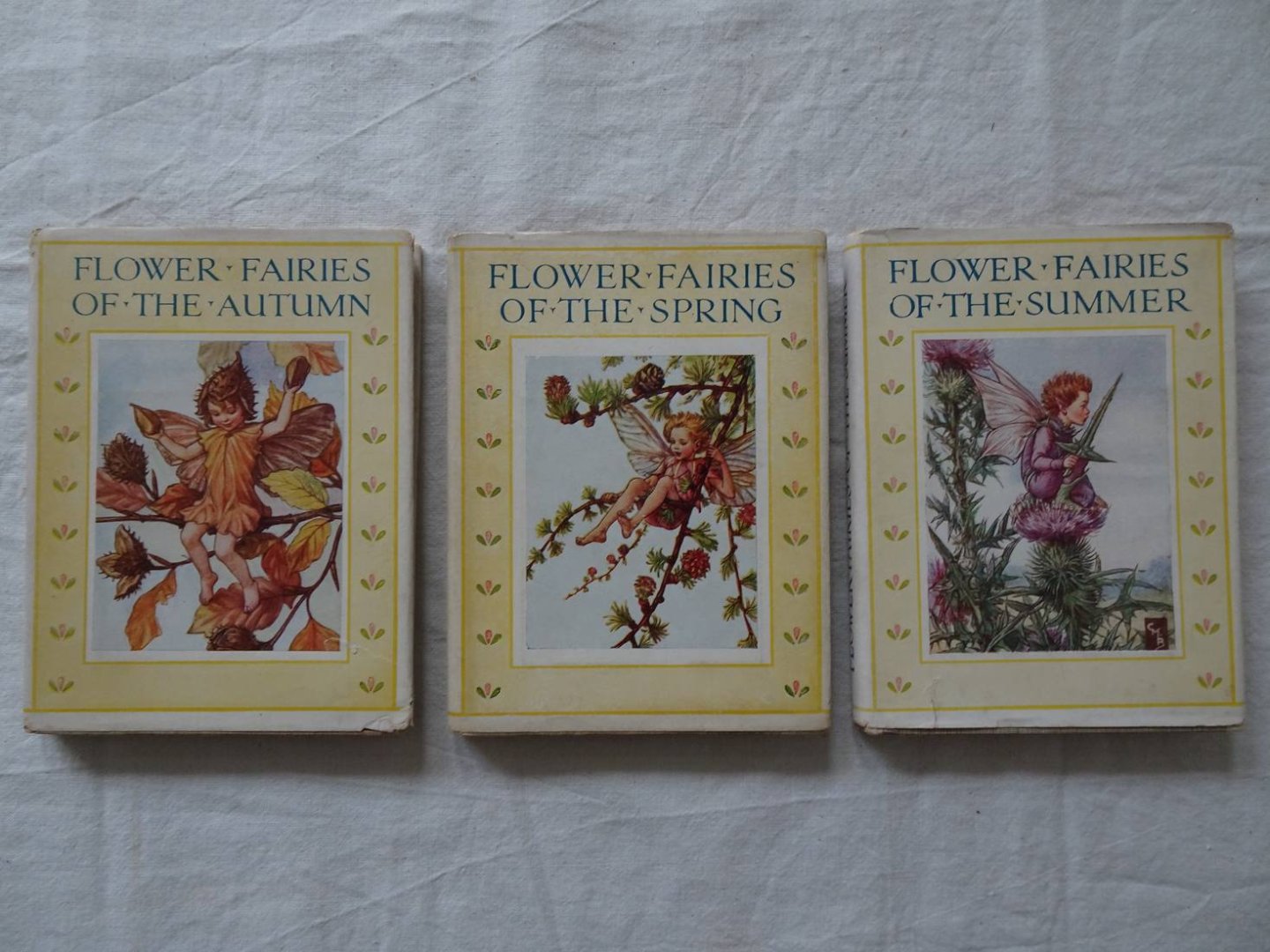 Barker, Cicely Mary. - Flower Fairies of the Autumn. With the nuts and Berries they bring/ Flower Fairies of the Summer/ Flower Fairies of the Spring. 3 titles.