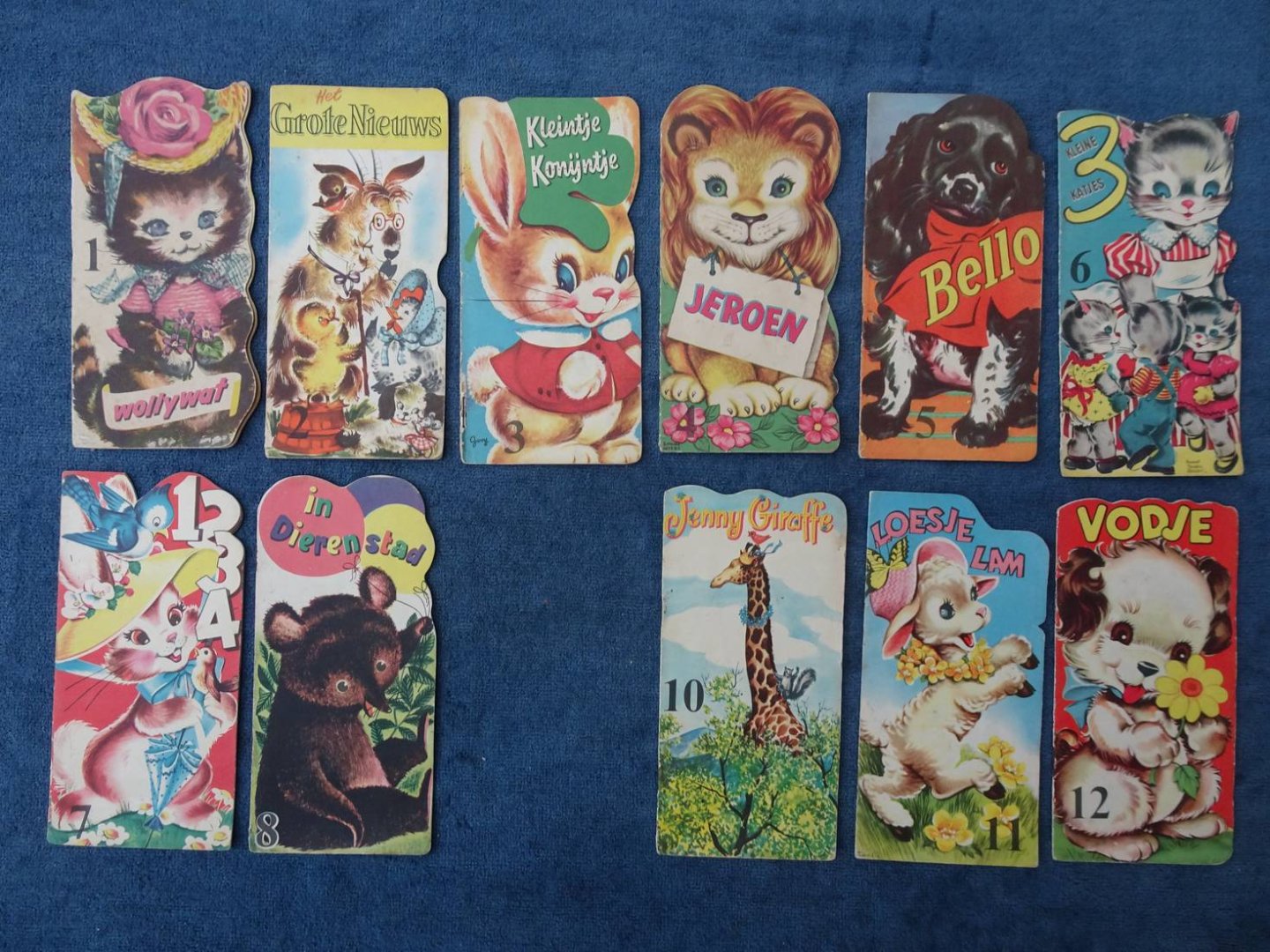 N.n.. - Wollywat/ Het Grote Nieuws/ Kleintje Konijntje/ Jeroen/ Bello/ 3 Kleine Katjes/ 1 2 3 4 / In Dierenstad/ Jenny Giraffe/ Loesje Lam/ Vodje. 11 deeltjes uit de reeks "Dierenboekjes", als Radion-geschenk aangeboden.