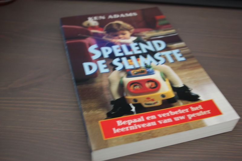 Adams, Ken - Spelend de slimste