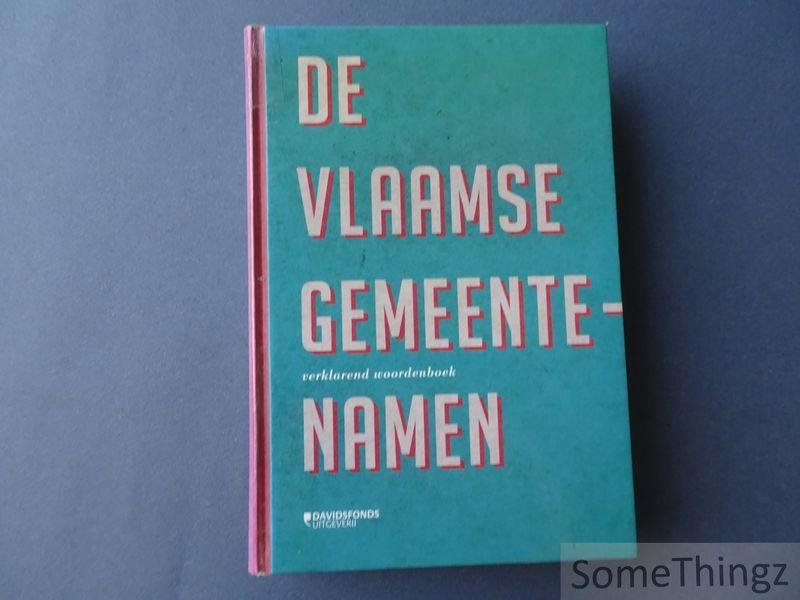 Debrabandere, Frans / Devos, Magda / Kempeneers, Paul / Mennen, Vic / Ryckeboer, Hugo. - De Vlaamse gemeentenamen : verklarend woordenboek.