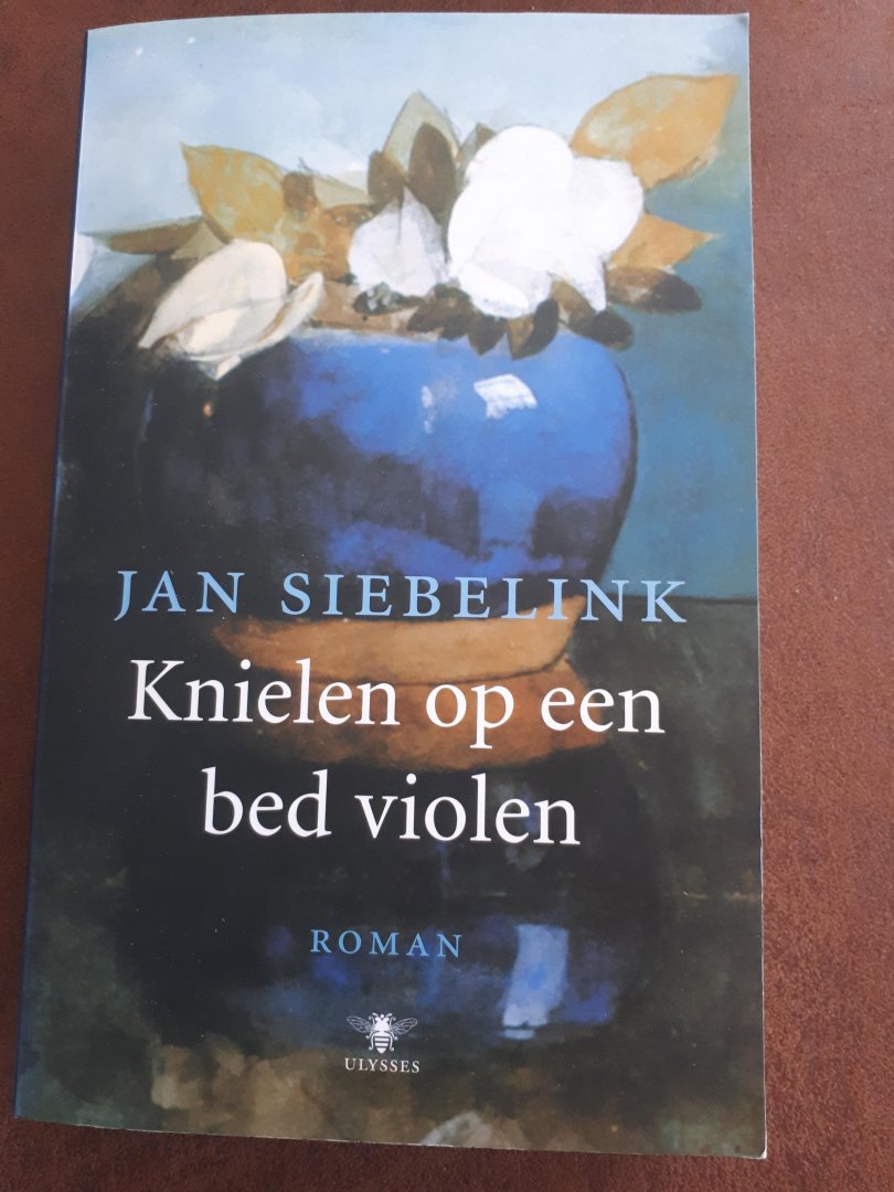 Jan Siebelink - Knielen op een bed violen