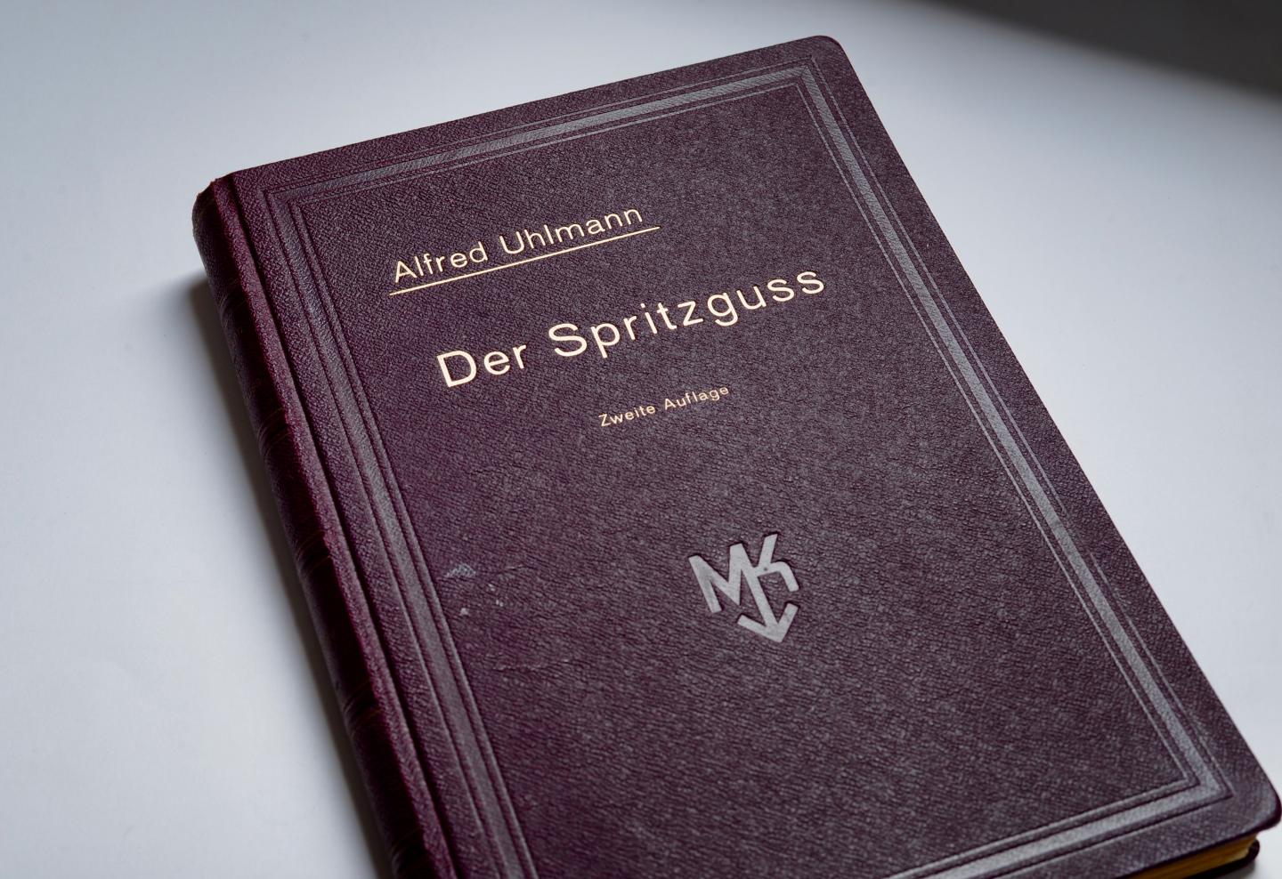 Uhlmann, Alfred - Der Spritzguss, Handbuch zur Herstellung von Fertigguß in Spritz-, Preß-, Vakuum- und Schleuderguß