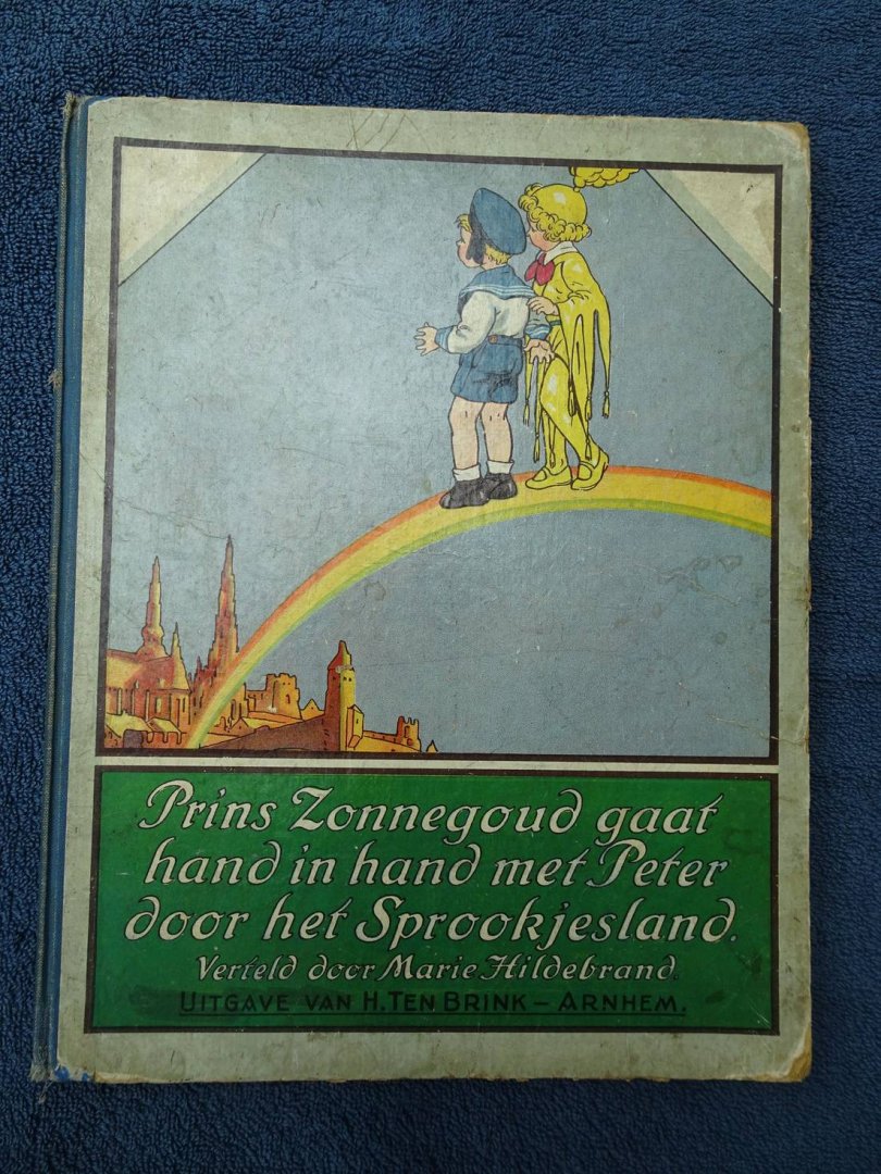 Hildebrandt, Marie. - Prins Zonnegoud gaat hand in hand met Peter door het Sprookjesland.