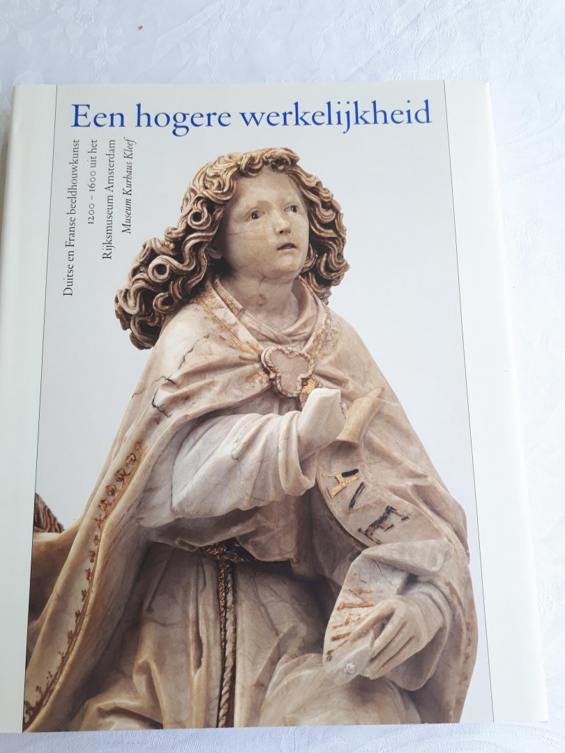SCHOLTEN, Frits en WERD, Guido de - Een hogere werkelijkheid / Duitse en Franse beeldhouwkunst 1200-1600 uit het Rijksmuseum Amsterdam