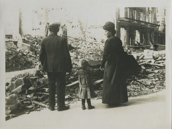 ASSOCIATED ILLUSTRATION AGENCIES LTD. - Civilians return to their homes in Amiens. A poor family look at the wreckage which was once their home.