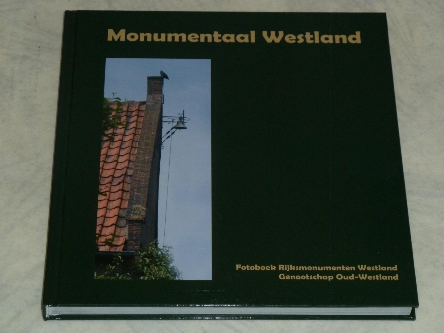 Groenewegen, Harry  / Middelburg, Arie-Frans /  Nieuwenhuizen, Ron  / Straalen, Thomas van  / Taalzorg, Isis - Monumentaal Westland. Fotoboek Rijksmonumenten Westland.