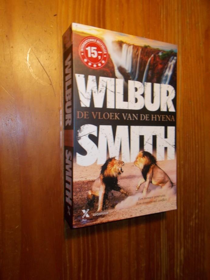 SMITH, WILBUR, - De vloek van de hyena.