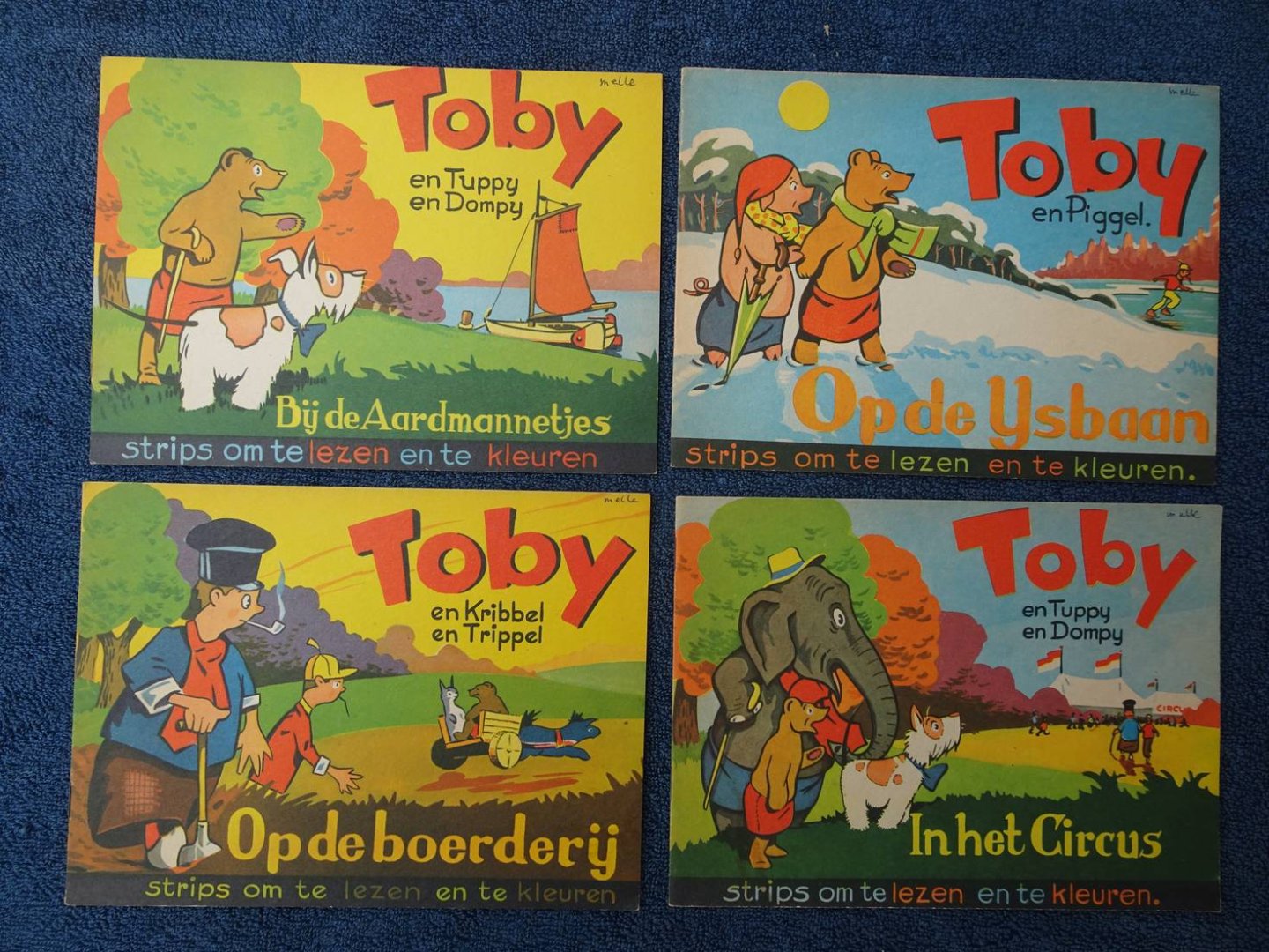 N.n.. - Toby en Tuppy en Dompy. In het Circus/ Toby en Piggel. Op de IJsbaan/ Toby en Kribbel en Trippel. Op de Boerderij/ Toby en Tuppy en Dompy. Bij de Aardmannetjes. Strips om te lezen en te kleuren. 4 deeltjes.