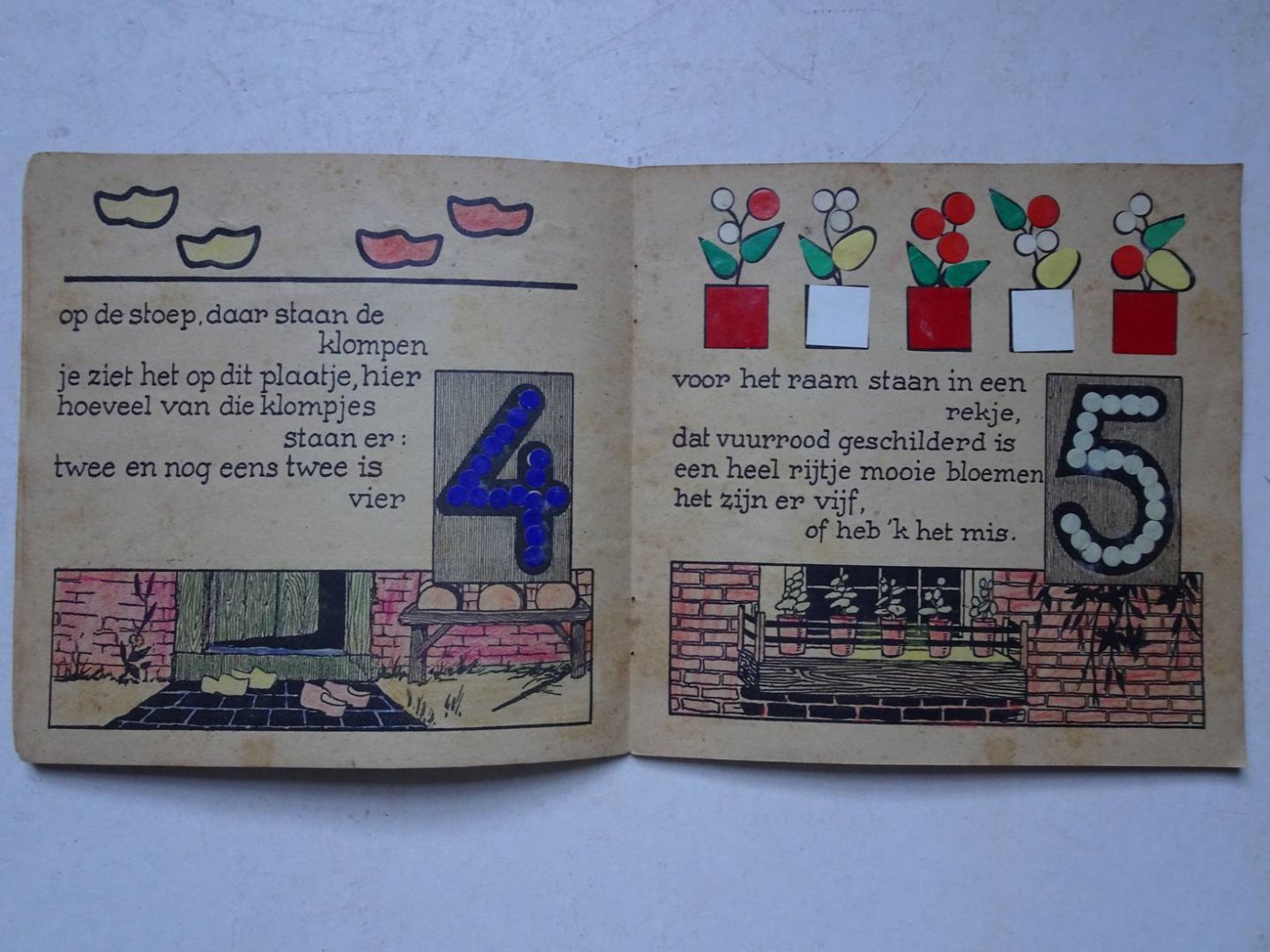 Vinger, Truus. - Van 1 tot 12. Plakken en tellen. Plaatjes en versjes van Truus Vinger.