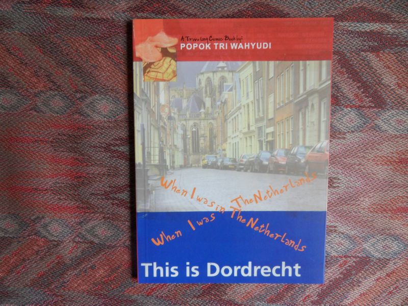Wahyudi, Popok Tri. - When I was in the Netherlands. - This is Dordrecht. - A traveling comic book.