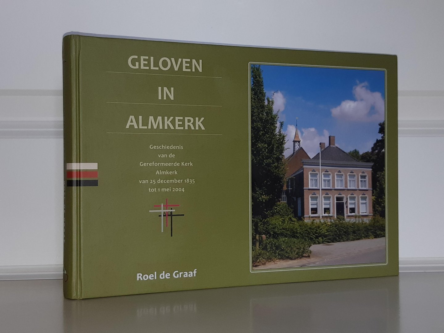 Graaf, Roel C.A. de - Geloven in Almkerk. Geschiedenis van de Gereformeerde Kerk Almkerk van 25 dec. 1835 tot 1 mei 2004