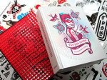 Surya , Shirley . [ isbn 9789628650477 ] - Tattoo Icons . ( Victionary . Three -  3  .  )  An ingenious collaborative project by some top designers, illustrators and artists from around the world combines to make this collection of special tattoo designs. If you are bored with the prevalent -