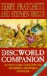 Pratchett, Terry; Briggs, Stephen - The discworld companion.
