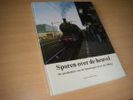 Veen, Jacob H.S.M. - Sporen over de heuvel. De geschiedenis van de Spoorwegen in en om Tilburg