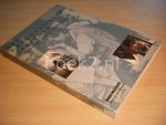 Emile Meijer en Joop Swart (samenstelling) - Het fotografische geheugen Twaalf kenners over persfotografie