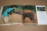 Gerry Ellis - Wild Orphans  (Fotoboek over jonge olifanten)