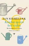 Jan Siebelink - Knielen op een bed violen
