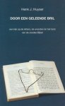 Huyser, Henk J. - Door een geleende bril. Een kijk op letters, de woorden én het land van de Joodse Bijbel.
