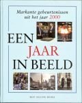 Memoriael , Bussum .. Omslagontwerp Mesika Design Hilversum - Een jaar in beeld. Markante gebeurtenissen uit het jaar 2000. met de gevreesde Millenniumbug en een begrotings overschot foto taart VAN EEN ECHTE BAKKER  en Minister Zalm VVD