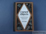 J. W. Ocker. - Cursed Objects : Strange but True Stories of the World's Most Infamous Items.