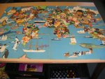 Wijga, Jan (1901-1978) illustraties - Wereldkaart in 18 delen van 26 x 16.5 cm bij Avro-wedstrijd "De wereldreis van St.-Nicolaas"