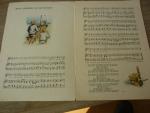 Beintema; R.  -  Stam; George  -  Zonderland; W. - De ivoren luit. Vijf Kerstliederen. Tekst met muziek voor piano of orgel; met tekeningen van Henk Krijger in kleur.
