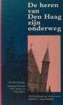 Niessen, Frits & Erik Jurgens. - De heren van Den Haag zijn onderweg. 100 gedichten over politiek & maatschappij. Een bloemlezing.