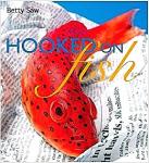 Saw , Betty . [ ISBN 9789812329615 ] 2720 - Hooked on Fish . ( Discover ways to cook a wide variety of fish - ranging from the humble carp, to prized cod and exotic salmon. Hooked on Fish is a collection of recipes comprising of both Asian and Western dishes, impressive not only for the -