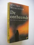 Mokeddem, Malika / Hemert, E.van, vert.uit het Frans - De Ontheemde (L'Interdite). Een vrouw keert terug naar Algerije