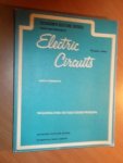 Edminister, Joseph A. - Theory and problems of electric circuits (Schaum's Outline Series). Including over 345 fully solved problems