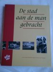 Schaaf, Ben van der (redactie) - De stad aan de man gebracht. Vijftig jaar gemeentevoorlichting in Rotterdam