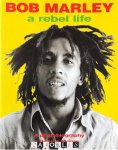 Dennis Morris, Paul A. Woods - Bob Marley. A rebel life.