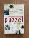 Verschuyl, H.J. - Het geheim van de puzzel. Geschiedenis van het puzzelen in Nederland